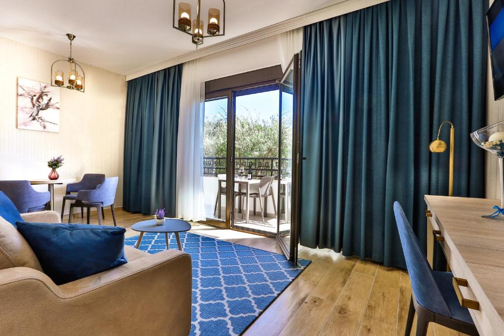 Posezení v ubytování Hotel Harmony by Aycon
