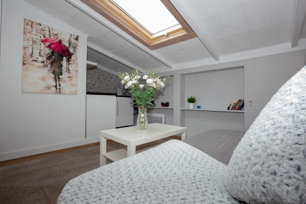 Posezení v ubytování Saska Kępa Apartamenty