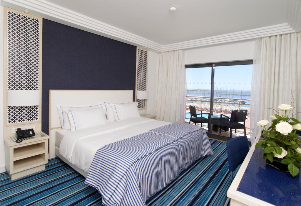 Cama ou camas em um quarto em Real Marina Hotel & Spa