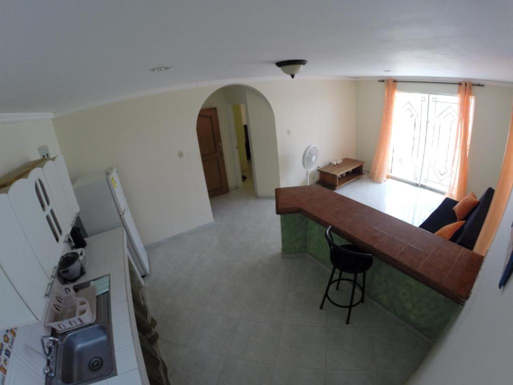 TV a/nebo společenská místnost v ubytování Zippy´s Sea View Apartments