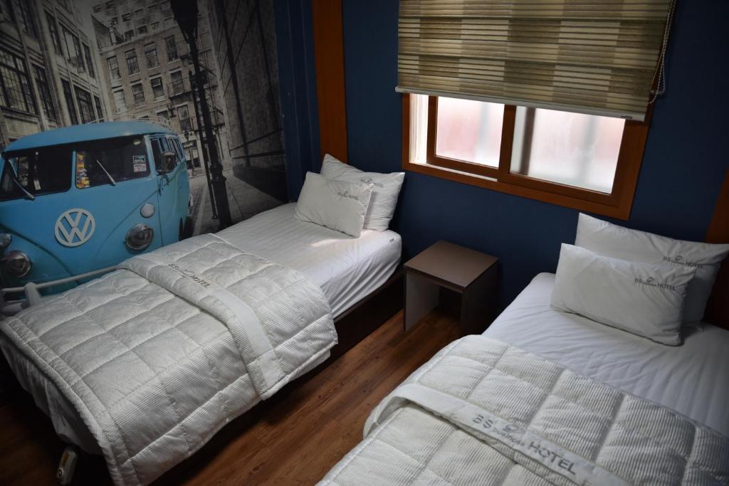 Postel nebo postele na pokoji v ubytování Business Hotel Busan Station