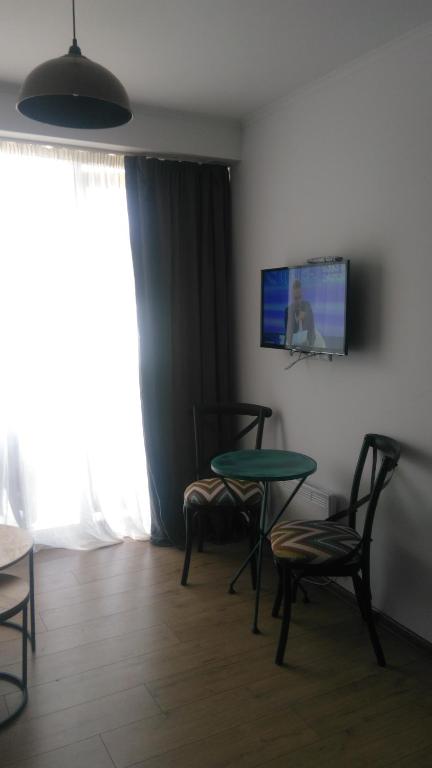 TV a/nebo společenská místnost v ubytování Apart Hotel ART
