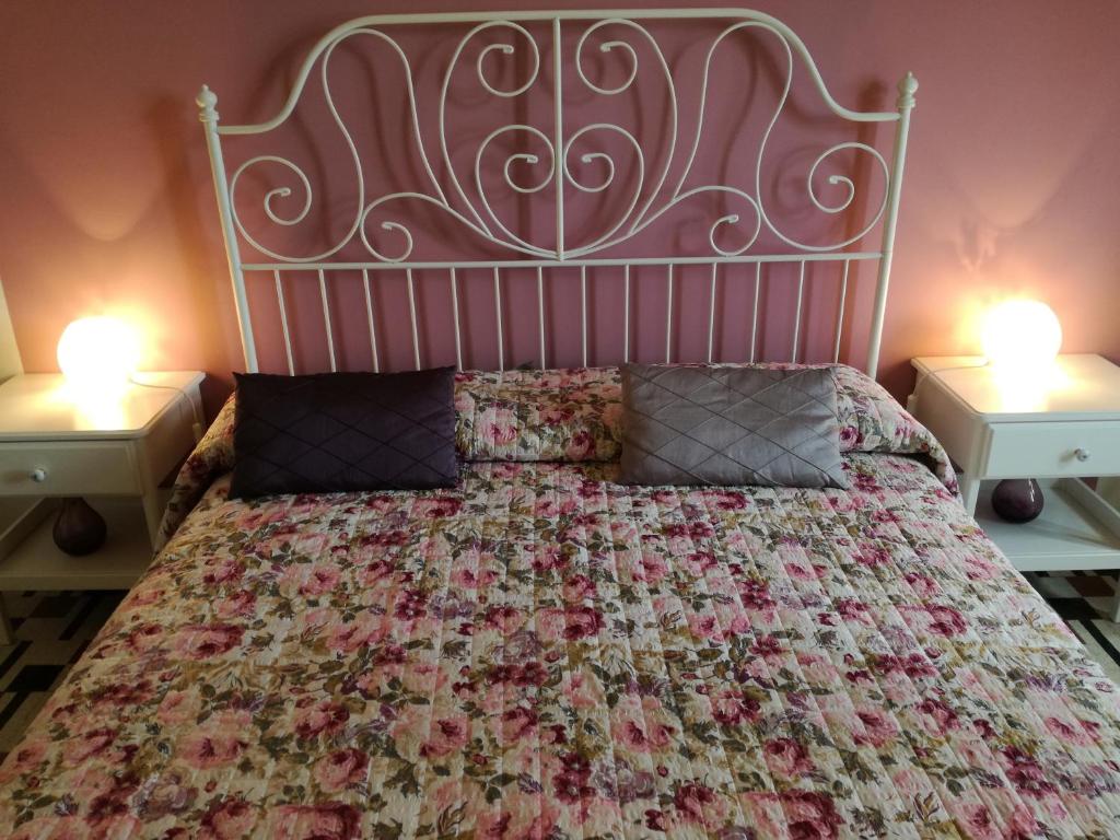 Postel nebo postele na pokoji v ubytování Aretè Guest House