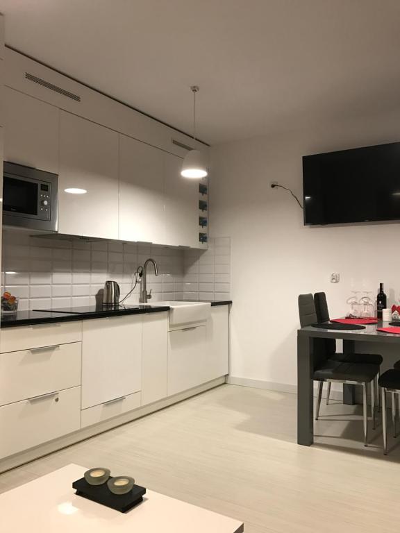 Kuchyň nebo kuchyňský kout v ubytování Apartament Kilfowa 15/8