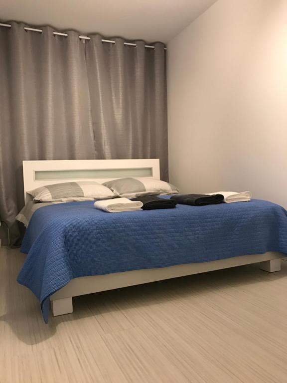 Postel nebo postele na pokoji v ubytování Apartament Kilfowa 15/8