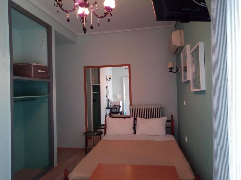 Posteľ alebo postele v izbe v ubytovaní Zappion Hotel