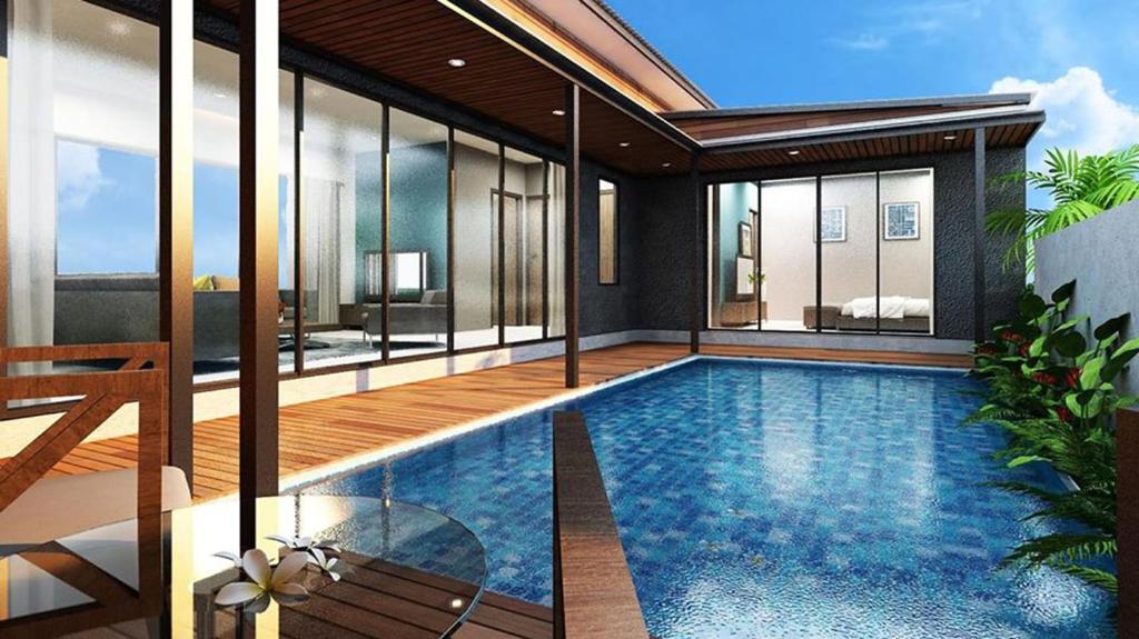 a pool in the middle of a house at PoolVilla Breeze Valley in Cha Am