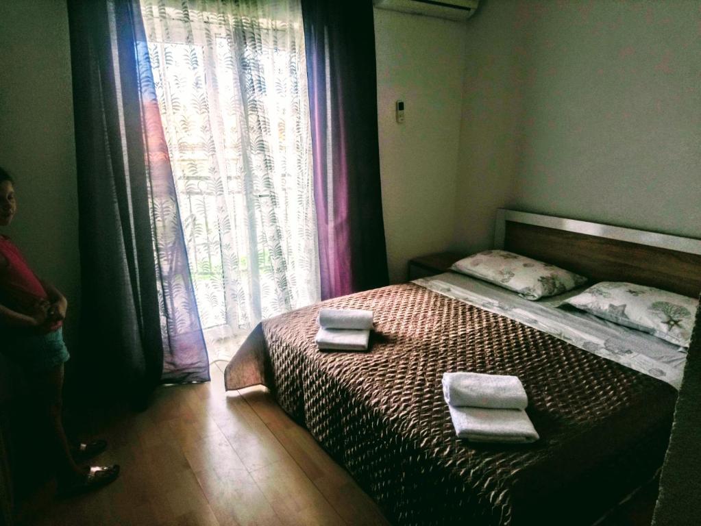 Postel nebo postele na pokoji v ubytování Apartmani Five