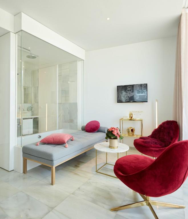 TV a/nebo společenská místnost v ubytování Hotel Aromar