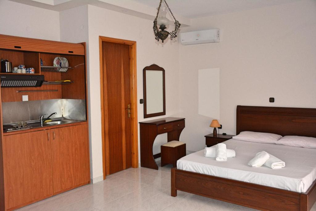 Postel nebo postele na pokoji v ubytování Mokos Rooms