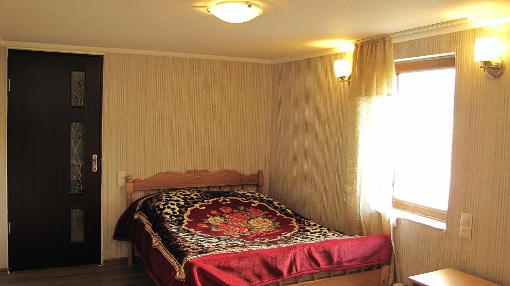 Postel nebo postele na pokoji v ubytování Ushguli Panorama Guest House