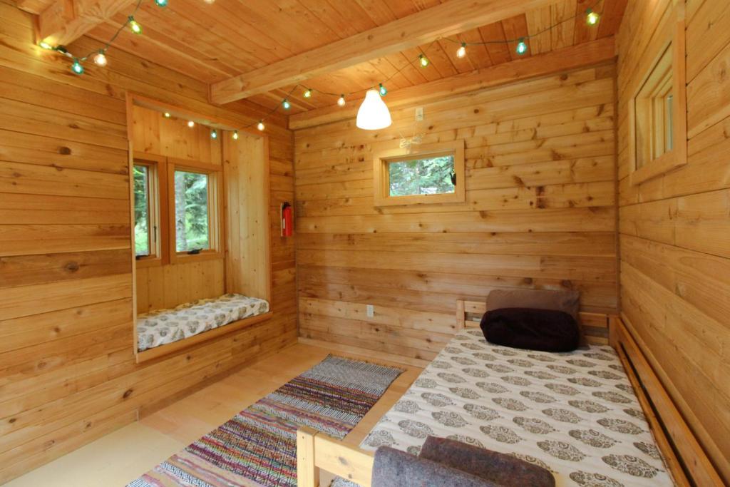 Postel nebo postele na pokoji v ubytování Shore Thing Retreat