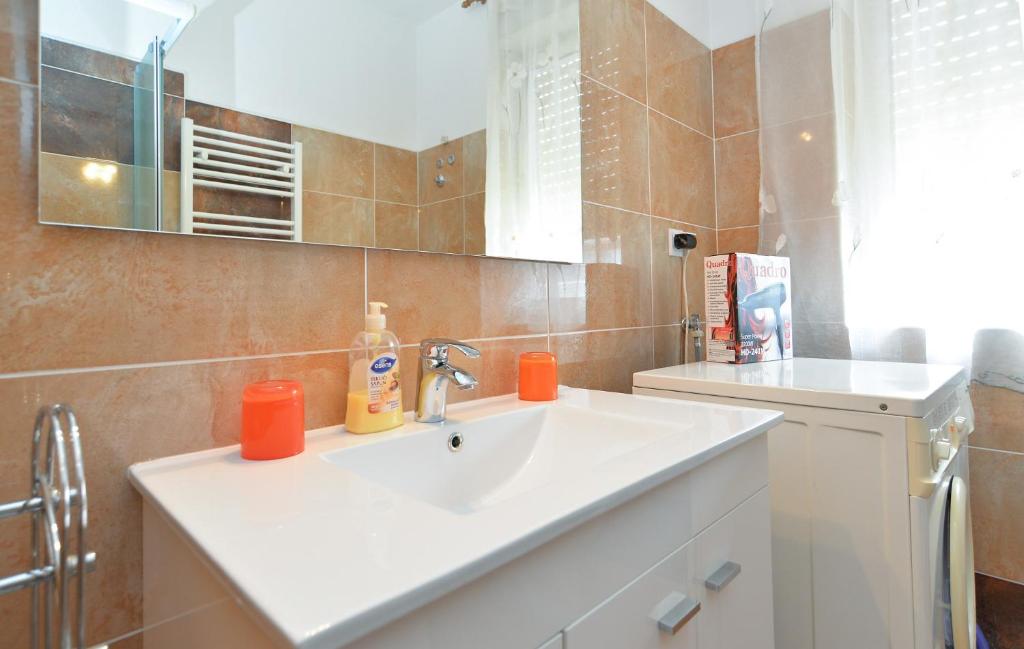 Koupelna v ubytování Apartment & Room Tanja 1552