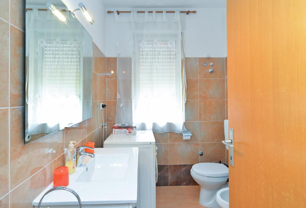 Koupelna v ubytování Apartment & Room Tanja 1552
