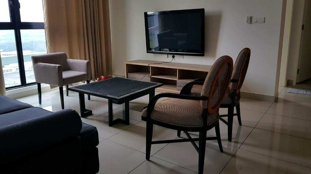TV a/nebo společenská místnost v ubytování IOI Golf Suite