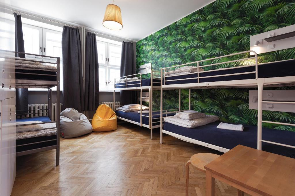 Posteľ alebo postele v izbe v ubytovaní Tatamka Hostel