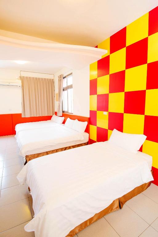 Postel nebo postele na pokoji v ubytování Happiness B&B