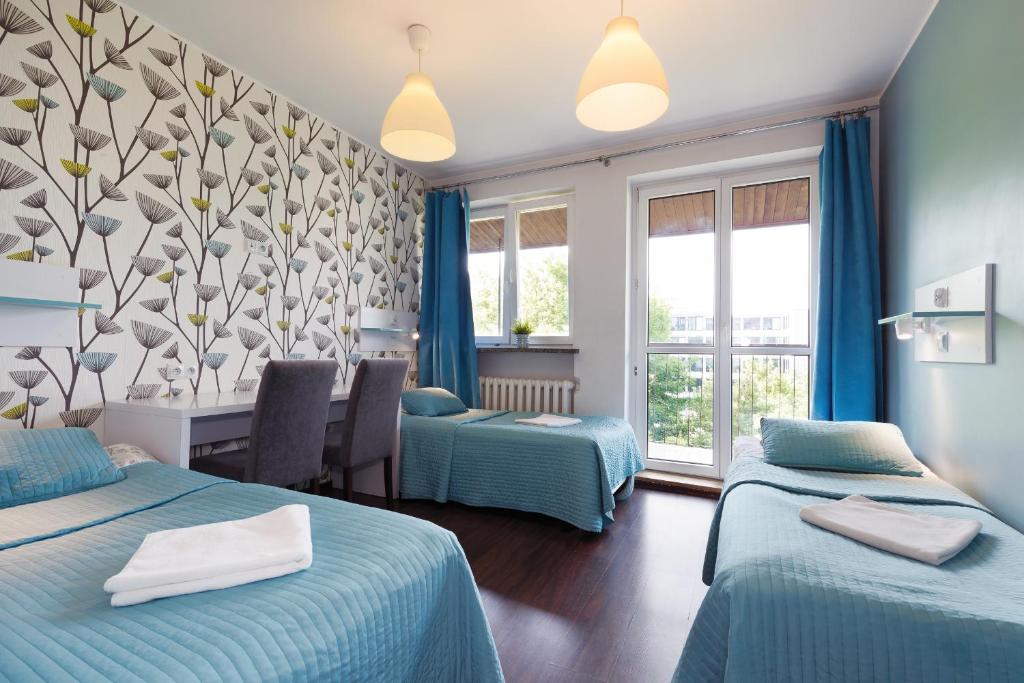 Posteľ alebo postele v izbe v ubytovaní Tatamka Hostel