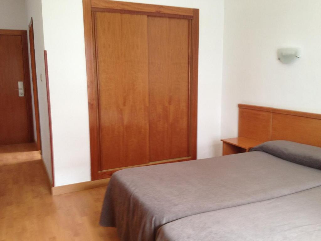 Postel nebo postele na pokoji v ubytování Hotel Teremar