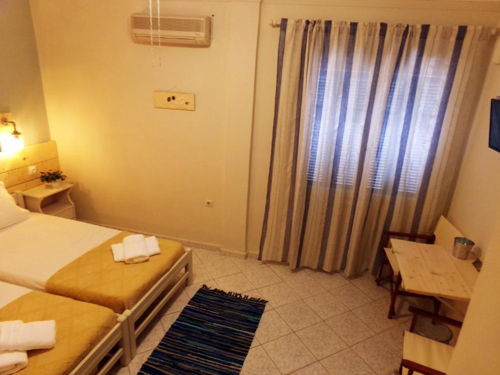 Postel nebo postele na pokoji v ubytování Leia Guest House