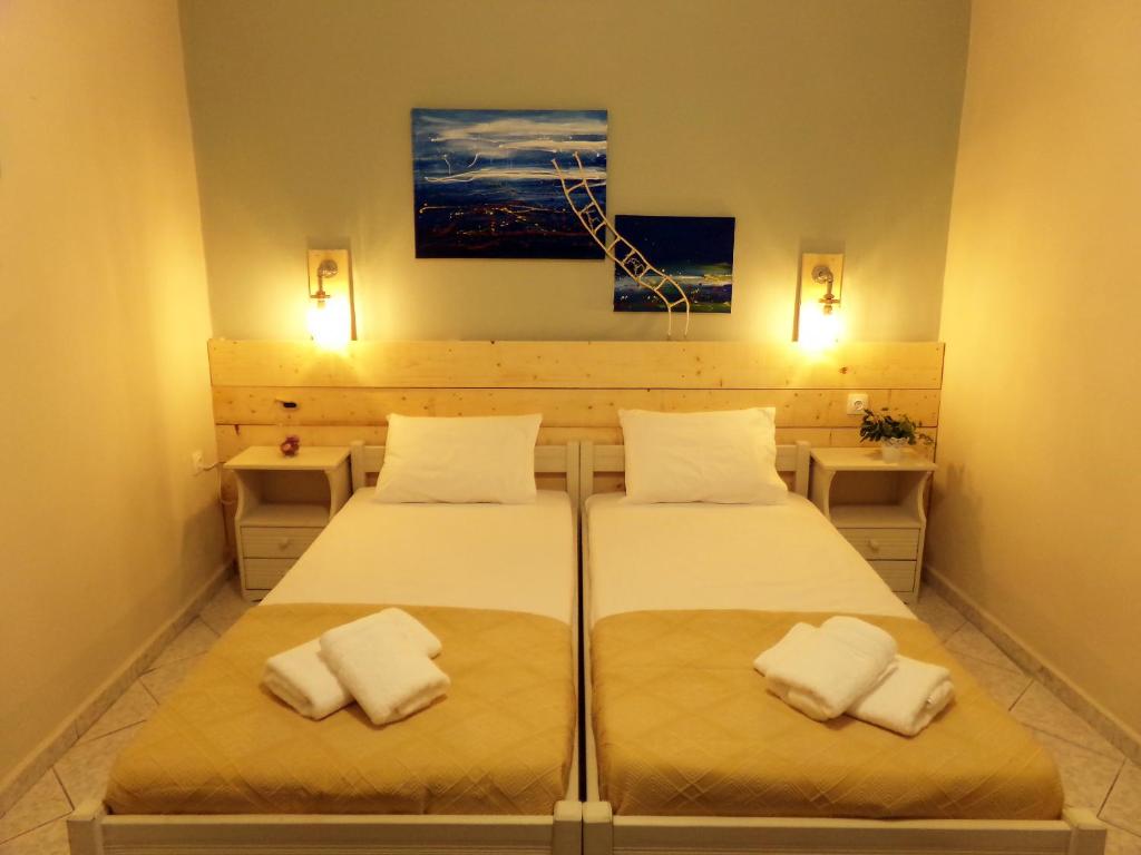 Postel nebo postele na pokoji v ubytování Leia Guest House