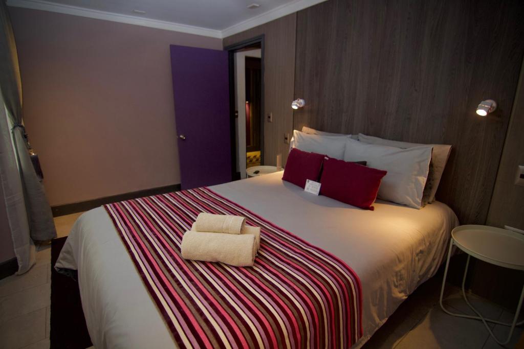 Postel nebo postele na pokoji v ubytování La Blanca Hotel