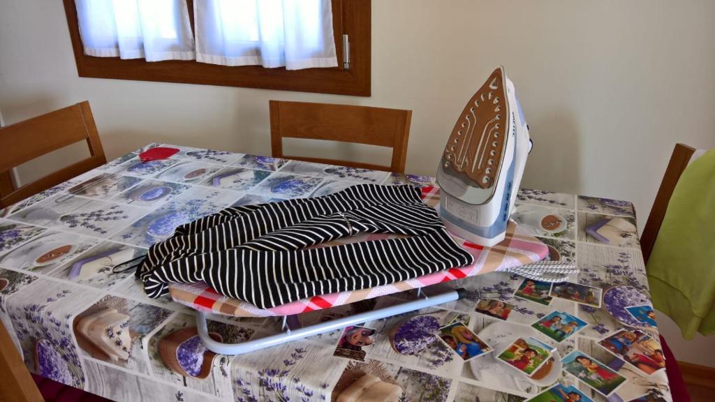 Postel nebo postele na pokoji v ubytování Agriturismo Ai Laghi