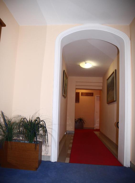 Postel nebo postele na pokoji v ubytování Garni Hotel PBG