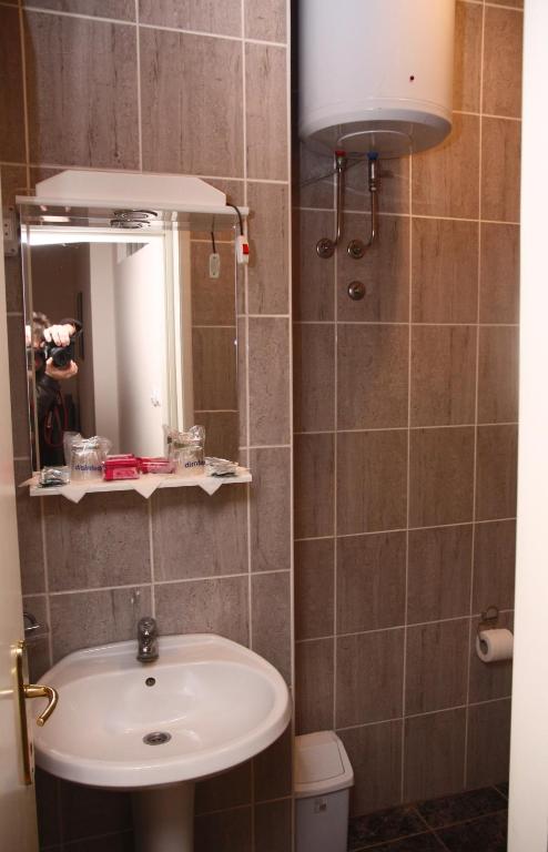 Koupelna v ubytování Garni Hotel PBG