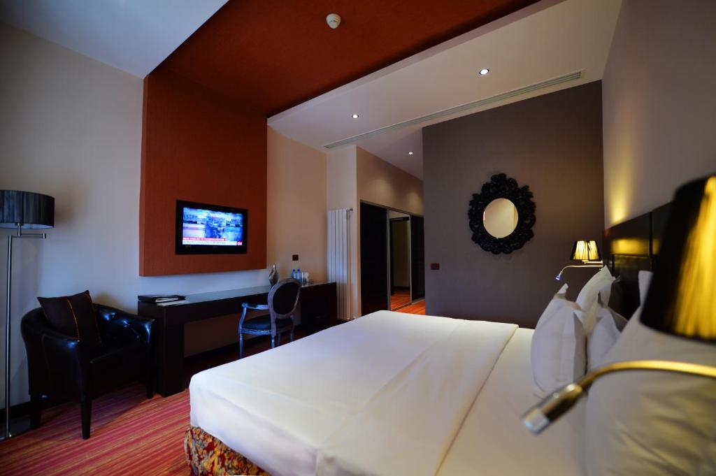 TV a/nebo společenská místnost v ubytování Nane Hotel