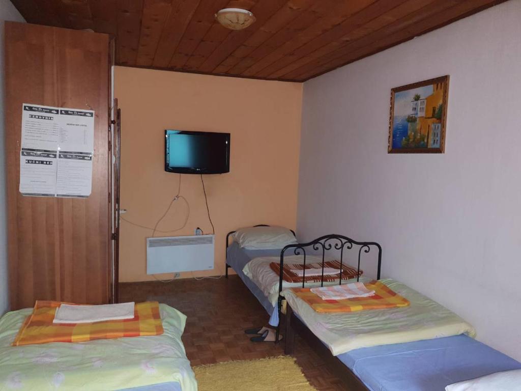 Cama o camas de una habitación en Vila De turist