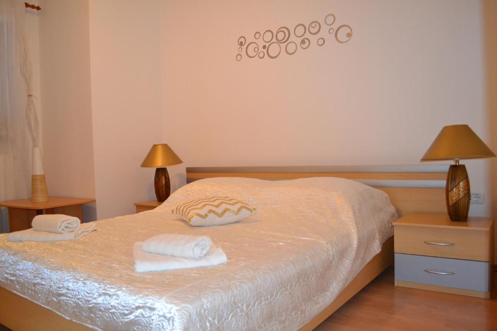 Postel nebo postele na pokoji v ubytování Apartman Doli