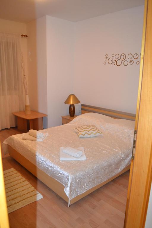 Postel nebo postele na pokoji v ubytování Apartman Doli