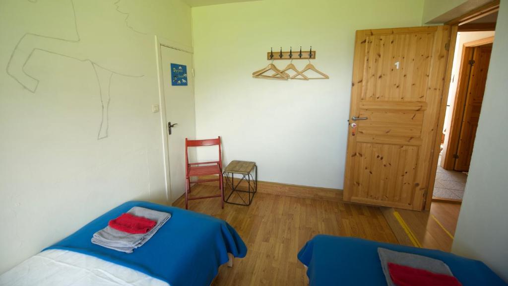 Postel nebo postele na pokoji v ubytování Dynjandi Guesthouse