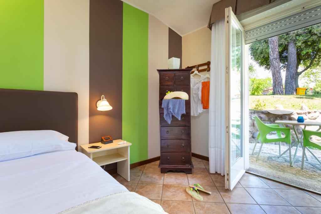 Posteľ alebo postele v izbe v ubytovaní West Garda Hotel
