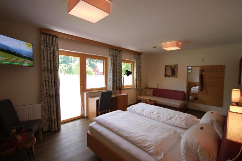 Postel nebo postele na pokoji v ubytování Haus Alexander