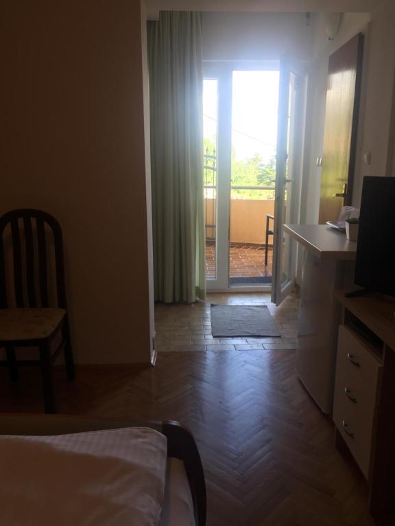 Postel nebo postele na pokoji v ubytování Guest House Panorama
