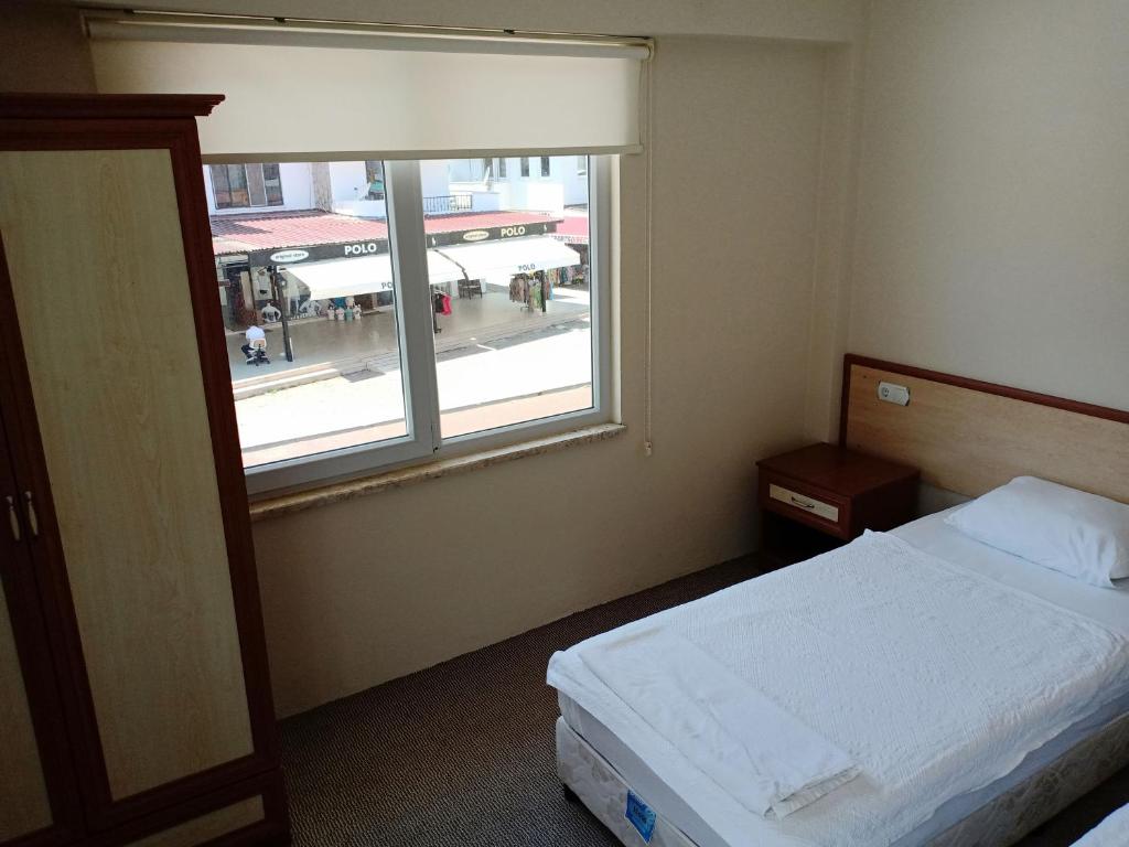 Postel nebo postele na pokoji v ubytování Sarıgerme Apart