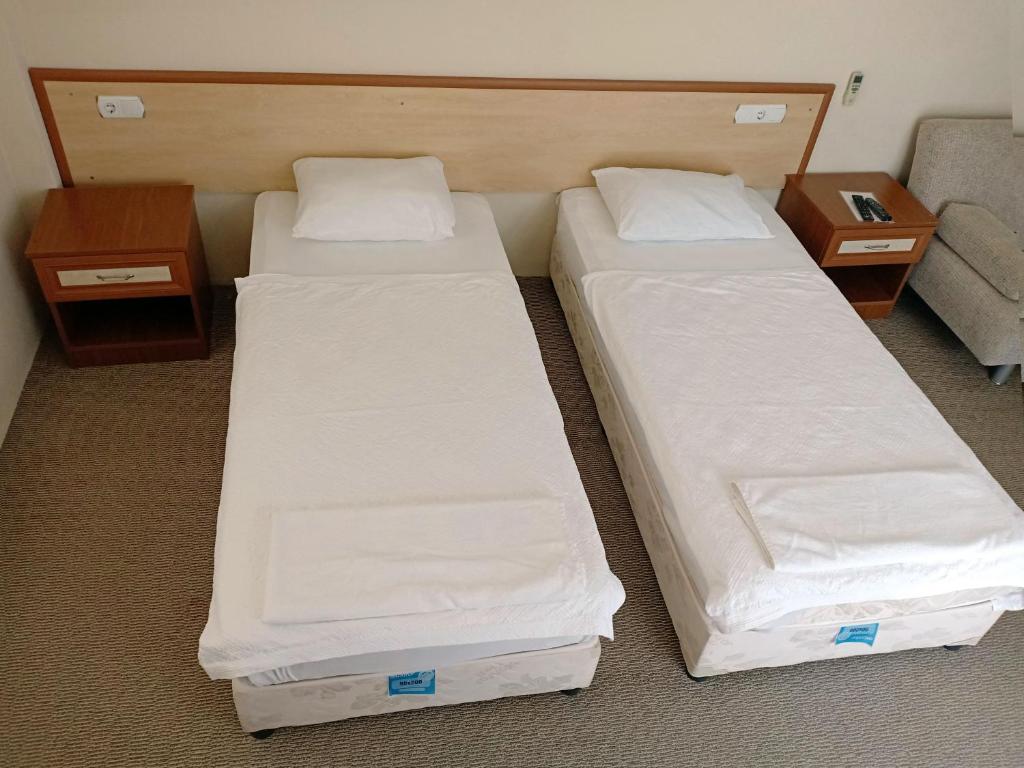 Postel nebo postele na pokoji v ubytování Sarıgerme Apart