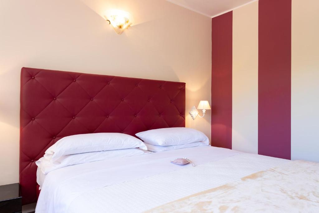 Posteľ alebo postele v izbe v ubytovaní West Garda Hotel