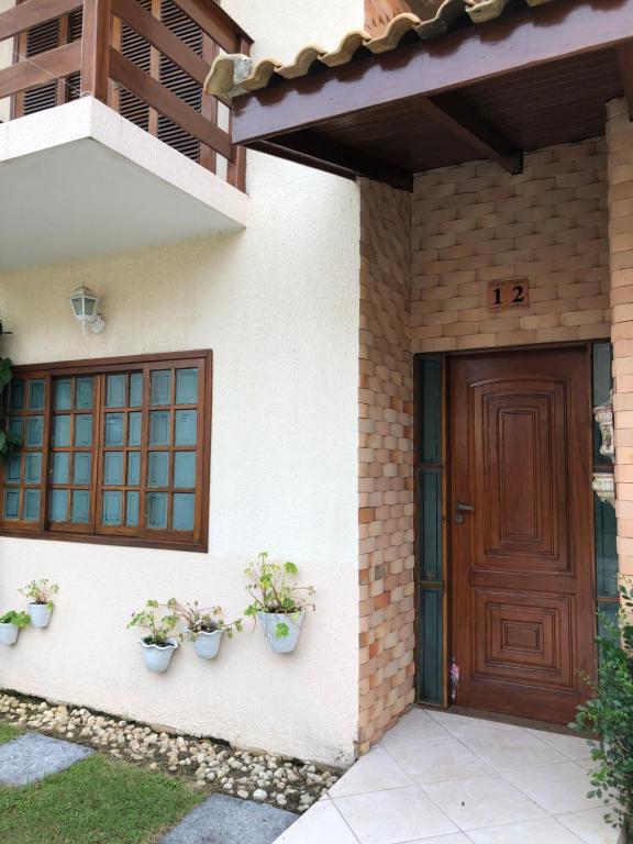  Casa condomínio fechado Bertioga