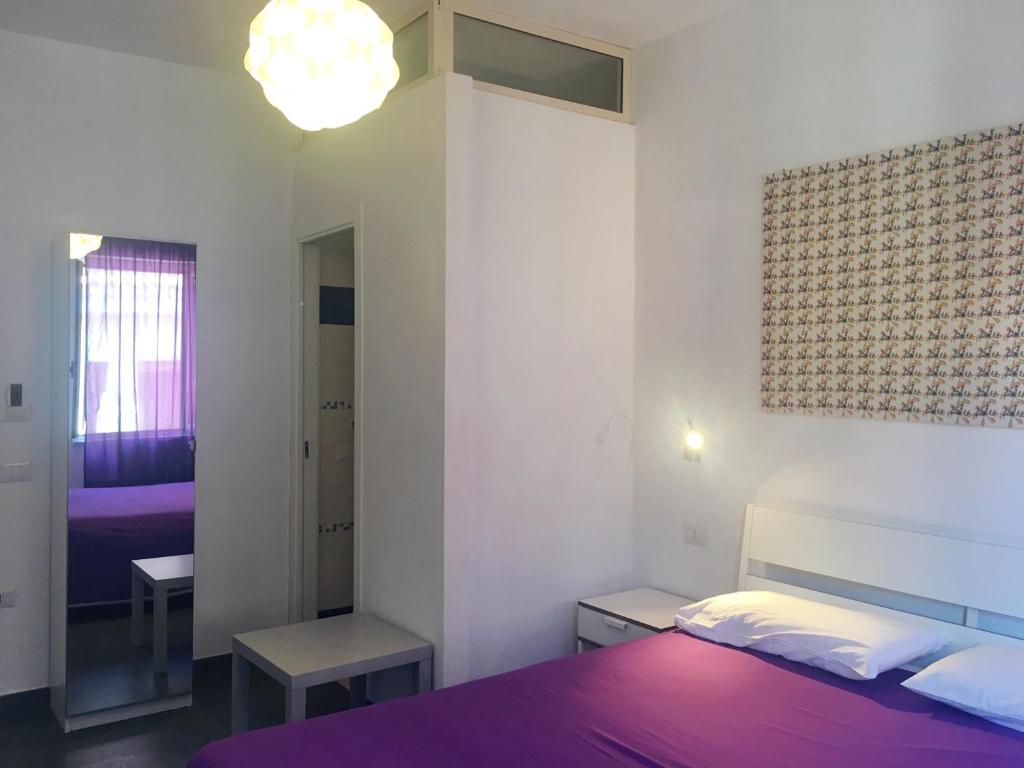 Letto o letti in una camera di Accomodation Libertino