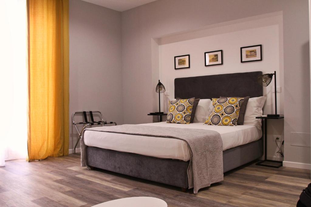Postel nebo postele na pokoji v ubytování BeA Guest House