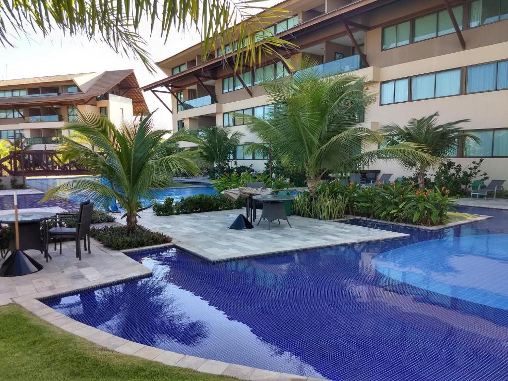 una imagen de un complejo con piscina en Fantástico Flat 02 qts Nui Supreme, en Porto de Galinhas