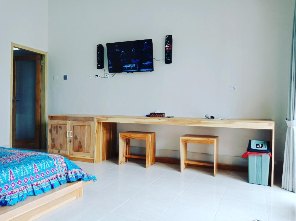TV a/nebo společenská místnost v ubytování Dragonfly Hostel and Homestay