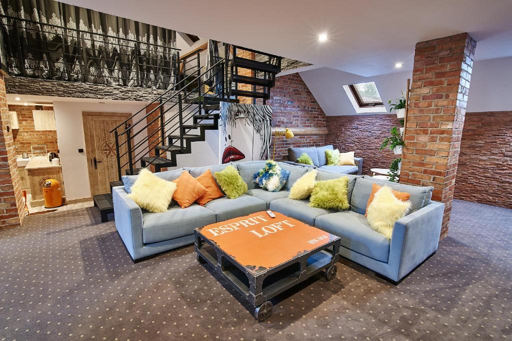 Posezení v ubytování Apartament Dwupoziomowy Nad Tamami