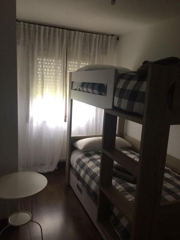 Postel nebo postele na pokoji v ubytování Apartamentos Campo de Golf