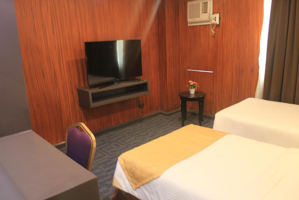 TV a/nebo společenská místnost v ubytování Butuan Grand Palace Hotel