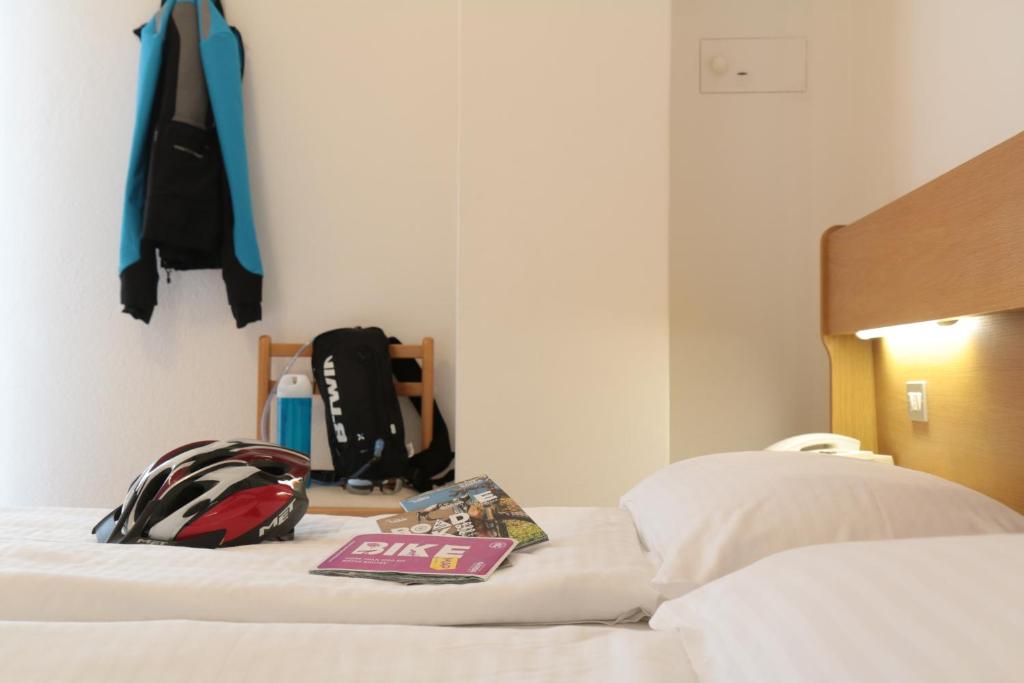 Postel nebo postele na pokoji v ubytování Hotel Villa Clara