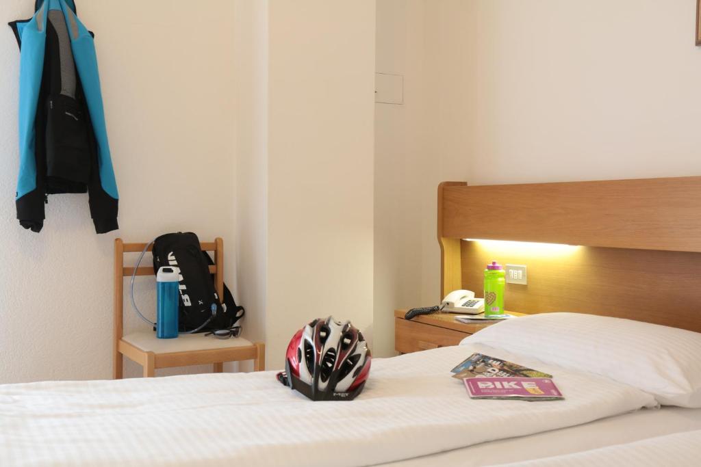 Postel nebo postele na pokoji v ubytování Hotel Villa Clara